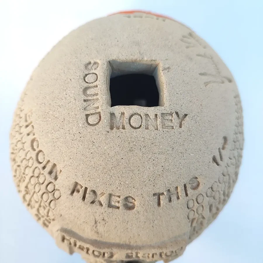 Yonat Vaks Bulla clay artwork inscribed with Sound Money and Bitcoin Fixes This, with History Started text visible at the base.